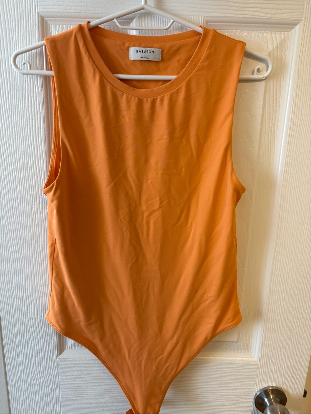 Babaton Orange Sleeveless Crewneck Bodysuit